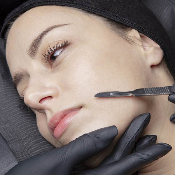woman getting derma-planing treatment